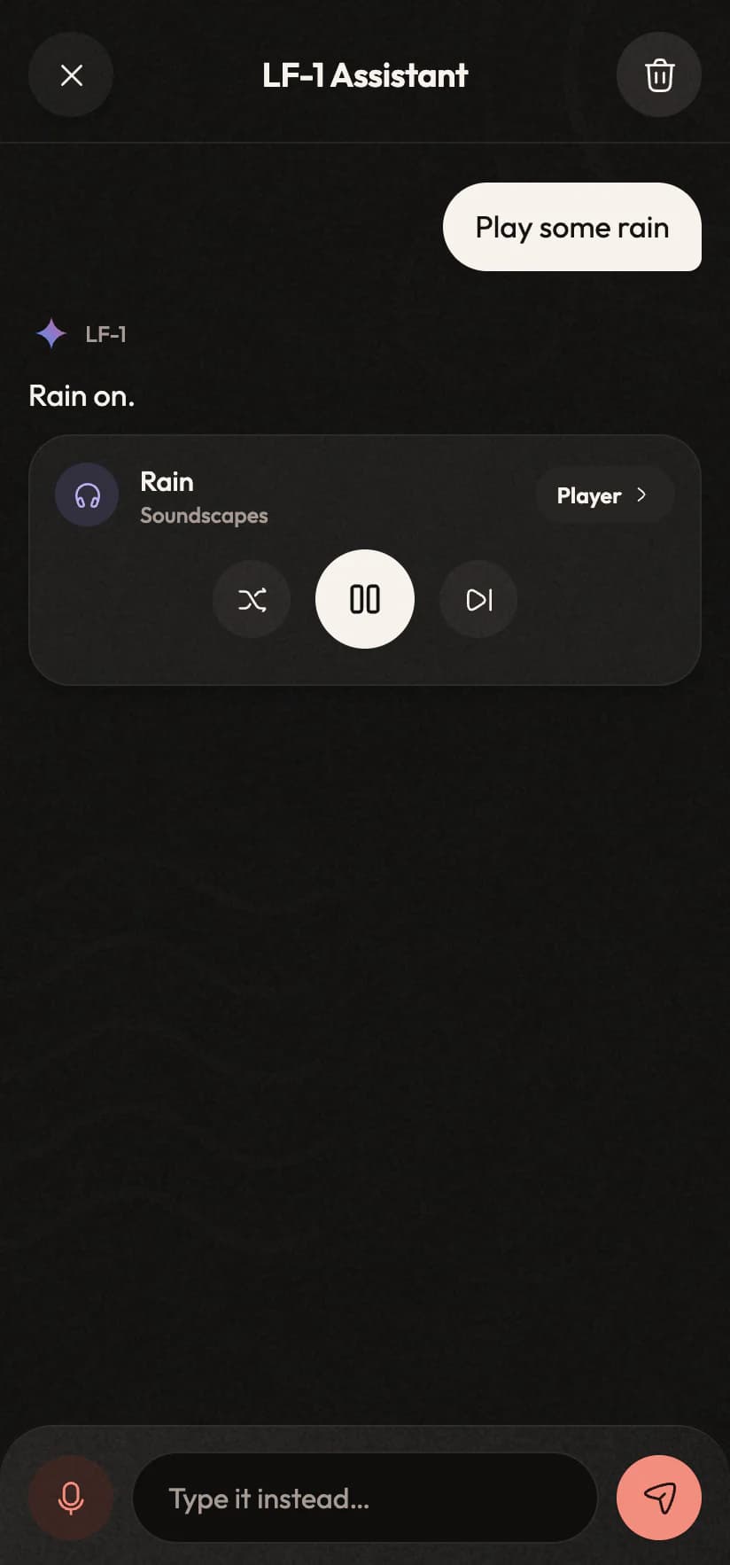 The assistant answering “Play some rain” with a player card